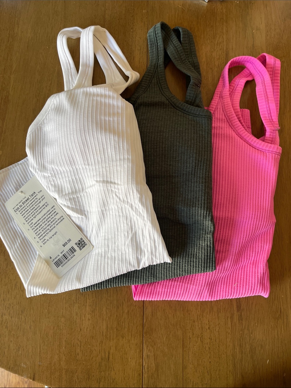 BUNDLE 3 lululemon ebb to street tanks, white green pink, size 4 NWT